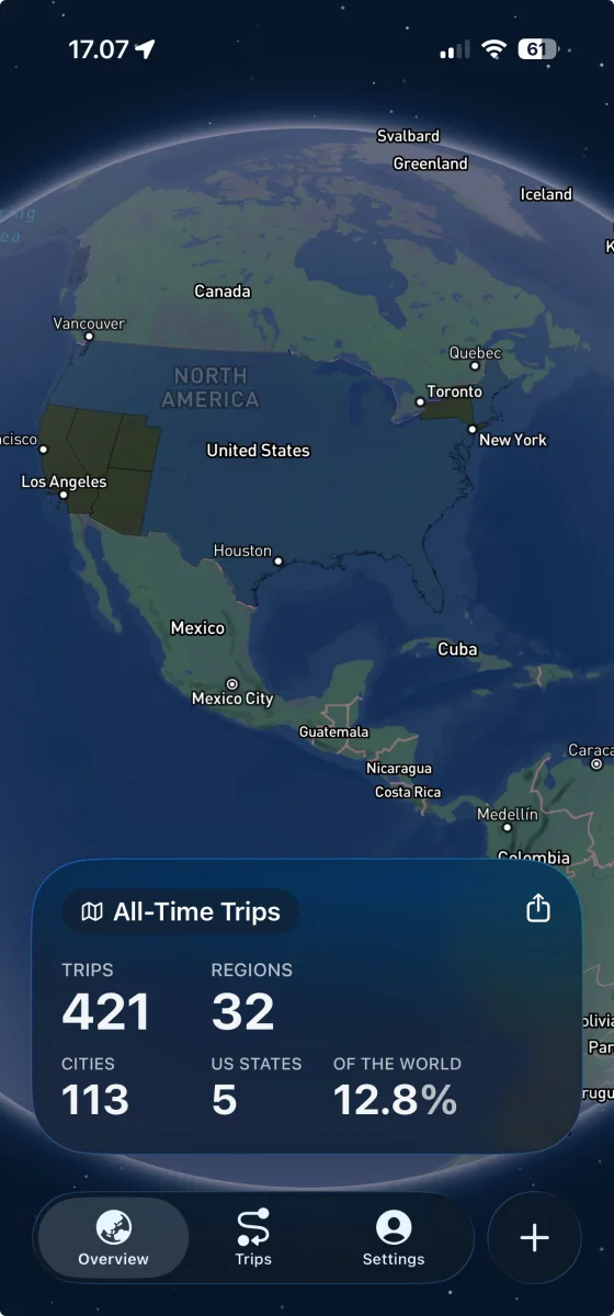 PassportPal iOS app showing interactive world map with visited countries highlighted in blue